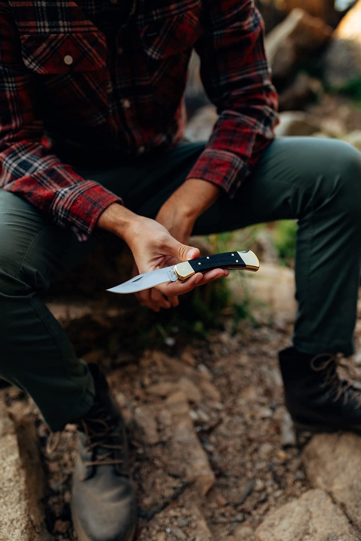 Buck Knives 110 Folding Hunter Knife, 3-3/4" Blade, Lockback Design, Ebony Handle, Brass Bolsters, 420HC Stainless Steel Clip Point Blade, Sheath Included, Hunting Knife Made in the USA, 7.2 oz